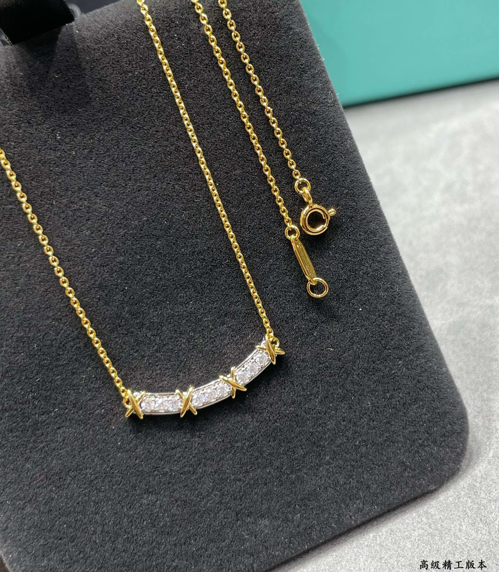 Tiffany & Co. Crossed Double Tone Necklace