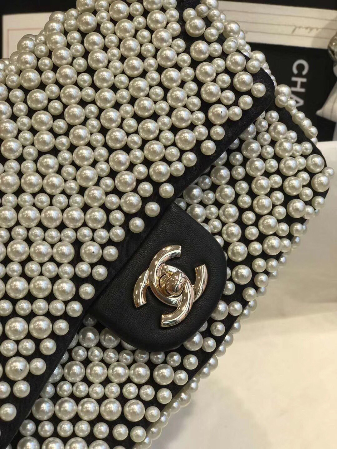 Chanel pearl on flap bag 5.9
