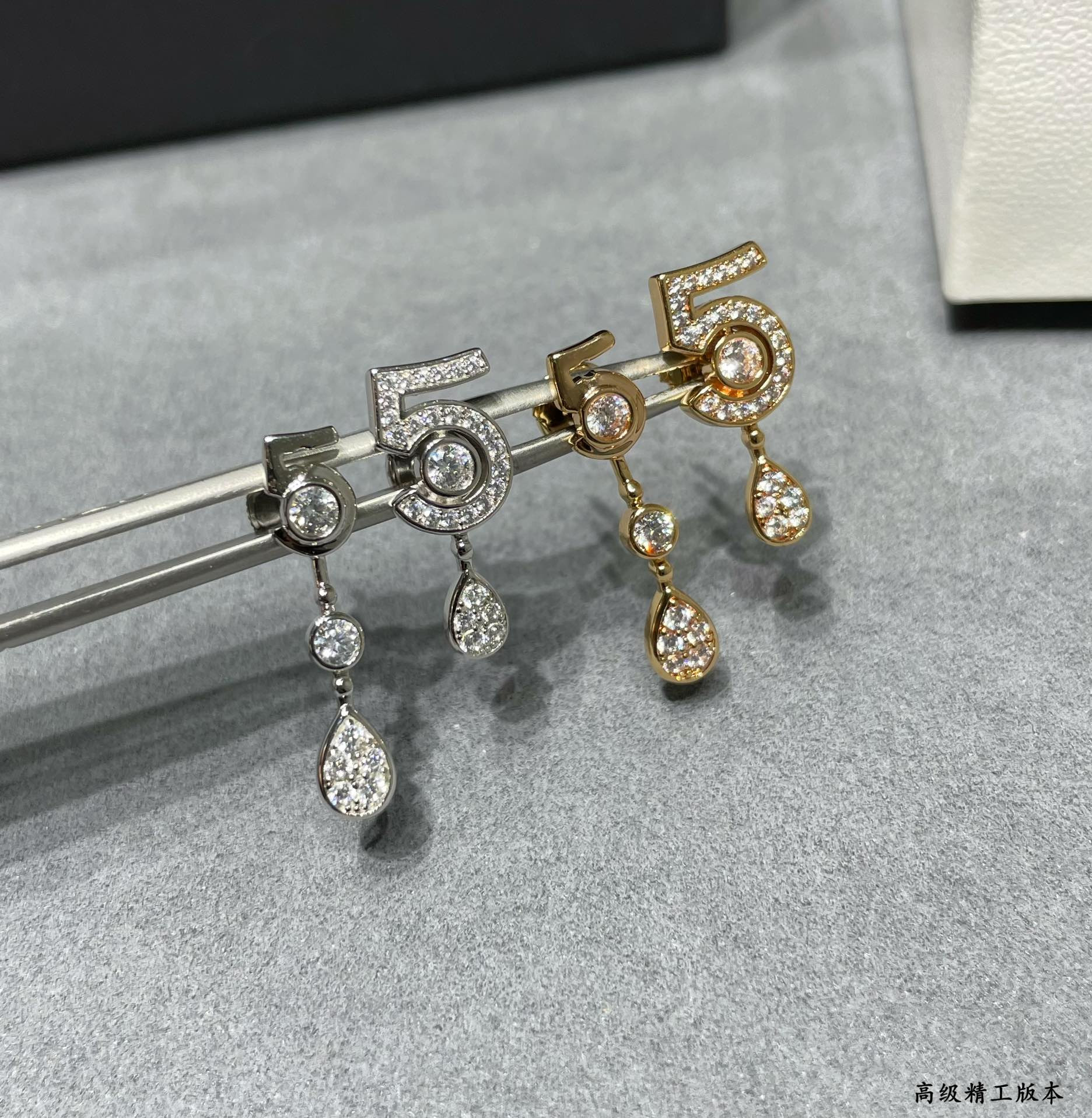 Chanel 5-word Earrings
