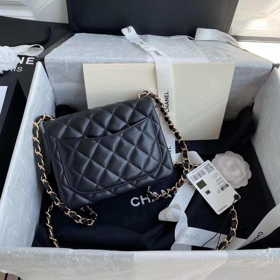 Chanel Mini Classic Handbag Lambskin & Gold-Tone Metal Black 5.3 × 6.6 × 3.1 in