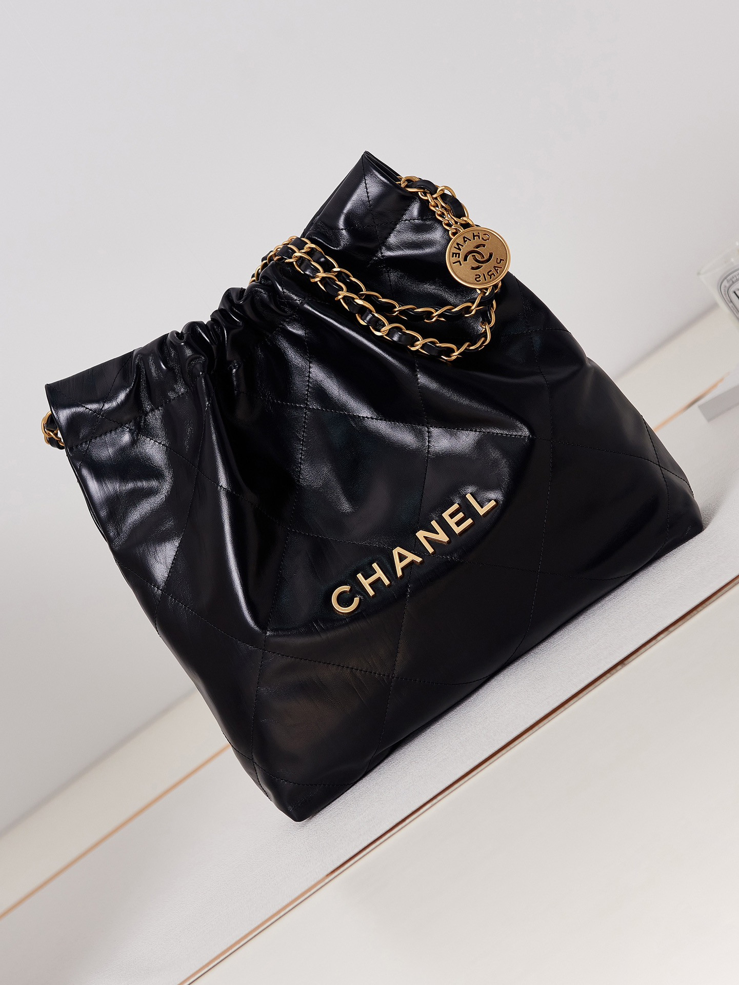 CHANEL 22 SMALL HANDBAG Shiny Calfskin & GOLD Metal BLACK 13.7×14.4×2.7 in