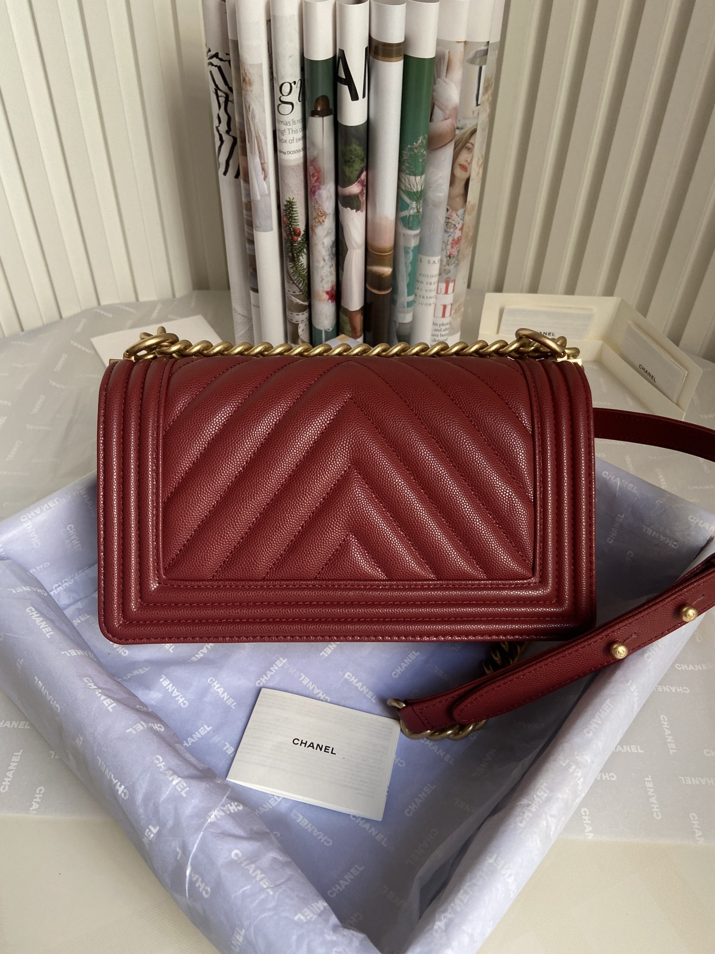BOY CHANEL HANDBAG Shiny Grained Calfskin & Gold-Tone Metal red 5.9 × 9.8 × 3.5 in