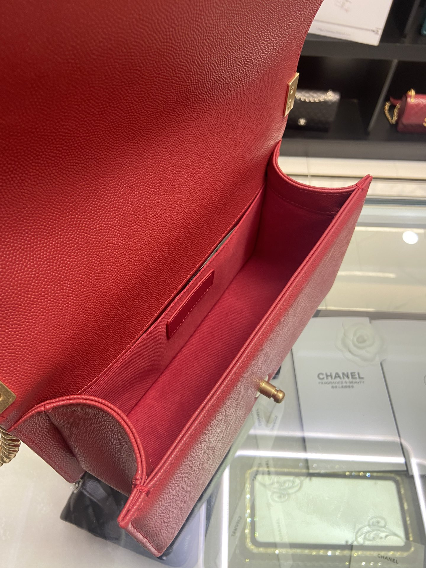 BOY CHANEL HANDBAG Shiny Red Grained Calfskin & Gold-Tone Metal 5.9 × 9.8 × 3.5 in