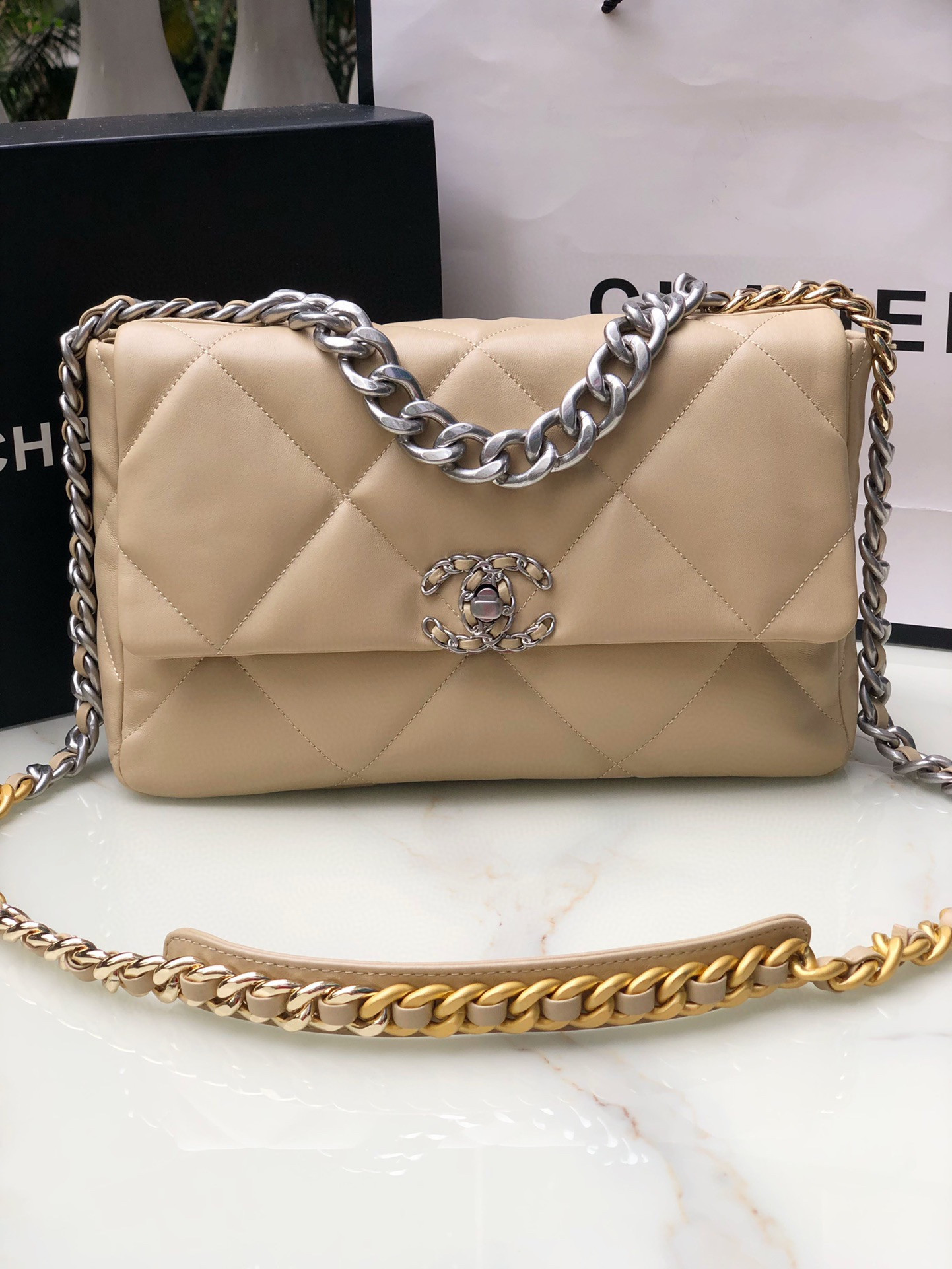 CHANEL 19 HANDBAG Shiny Leather, Gold-Tone, Silver-Tone & Ruthenium-Finish Metal Beige 30x20x10cm