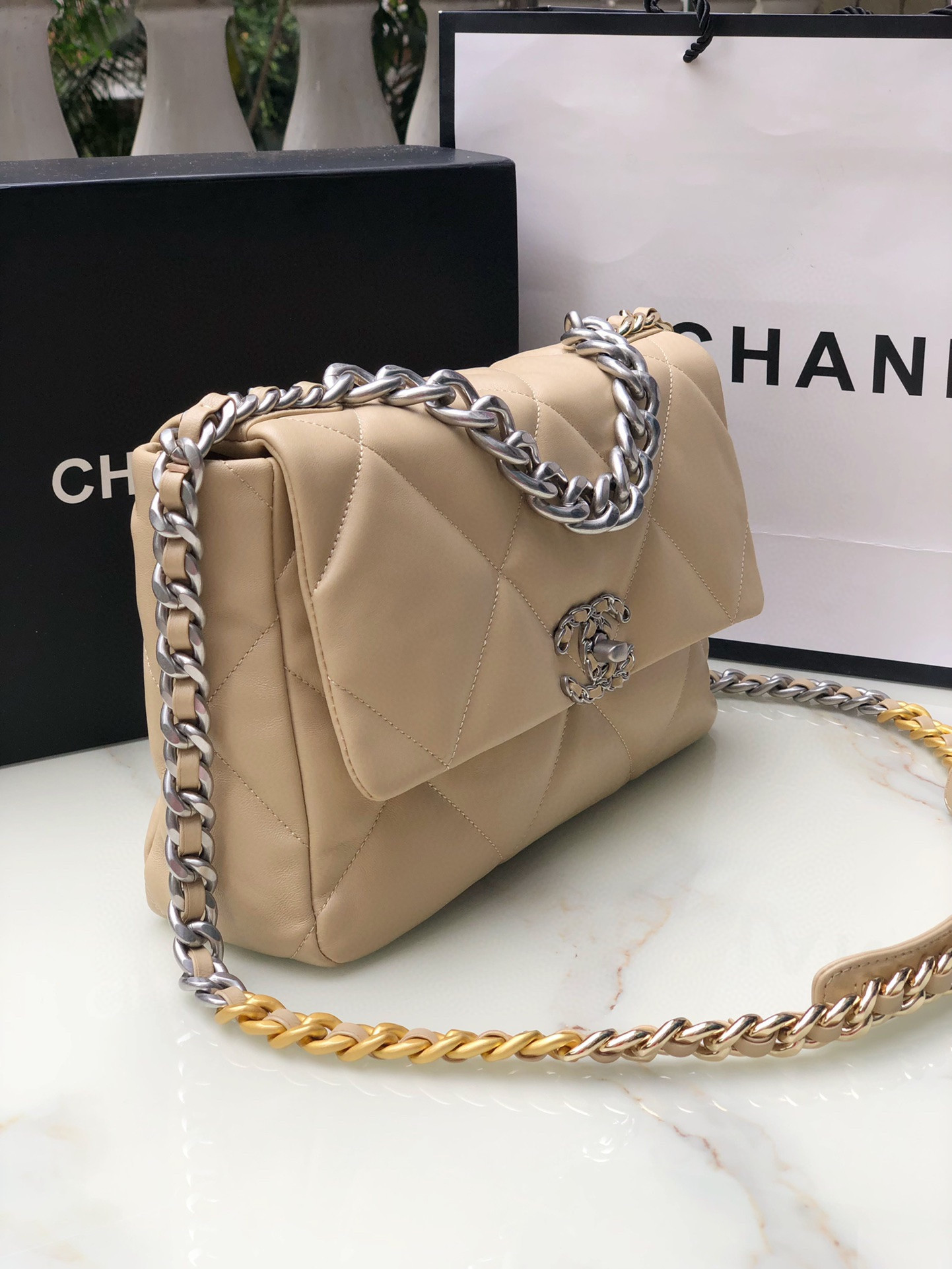 CHANEL 19 HANDBAG Shiny Leather, Gold-Tone, Silver-Tone & Ruthenium-Finish Metal Beige 30x20x10cm