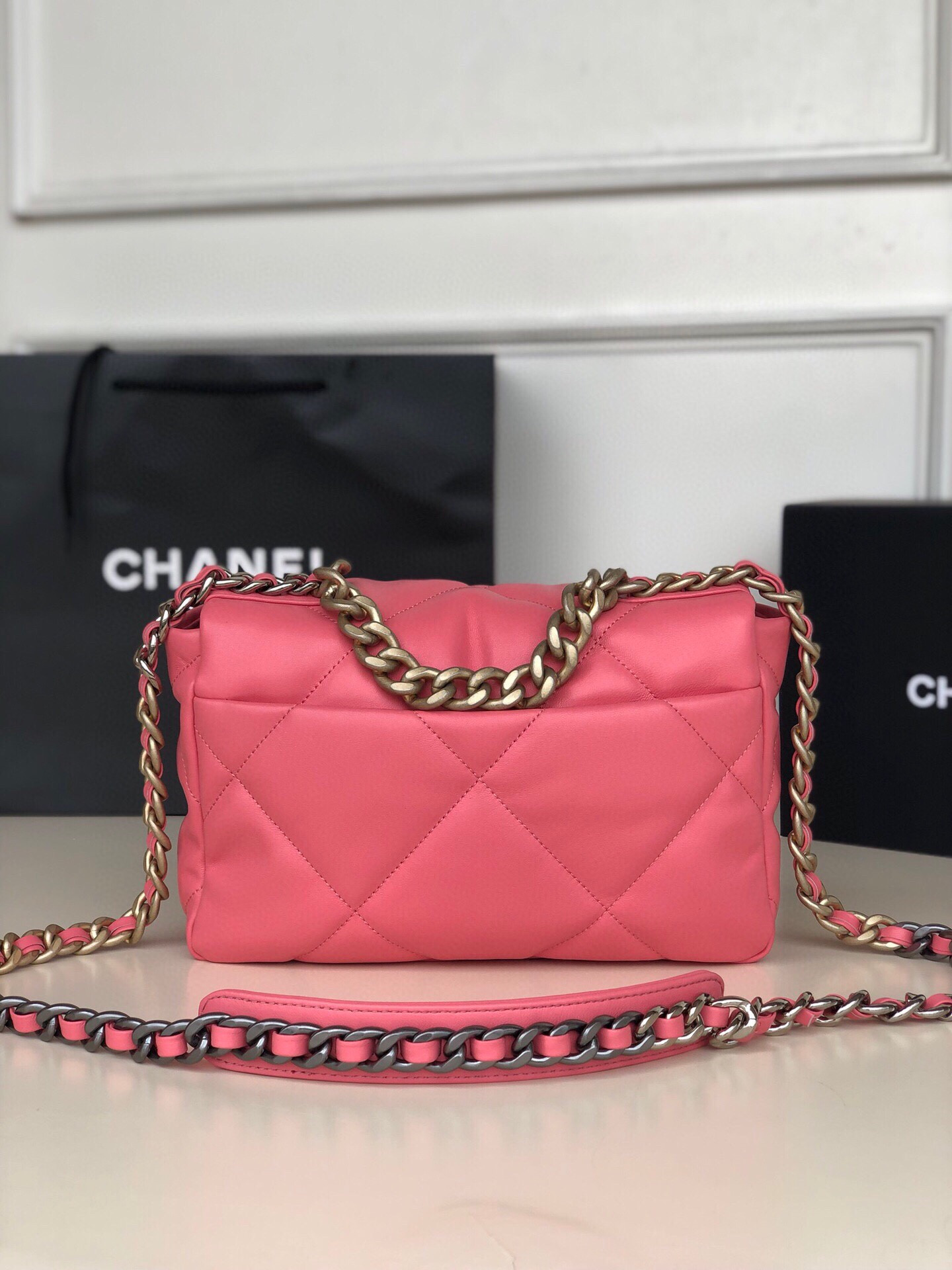 CHANEL 19 HANDBAG Shiny Leather, Gold-Tone, Silver-Tone & Ruthenium-Finish Metal Pink 6.2 × 10.1 × 3.5 in